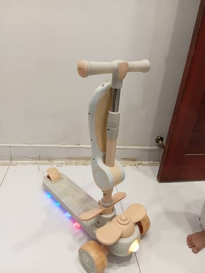 Kids scootie with Seat , music & lighting