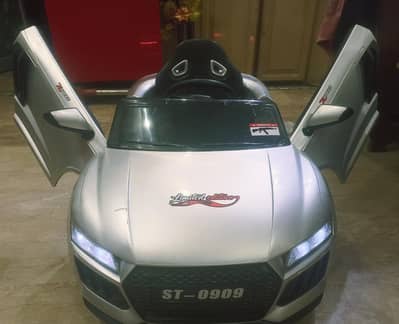 IMPORTED KIDS CAR with REMOTE /SWING FUNCTION &OPENABLE HYDROLIC DOORS