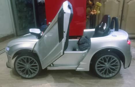 IMPORTED KIDS CAR with REMOTE /SWING FUNCTION &OPENABLE HYDROLIC DOORS