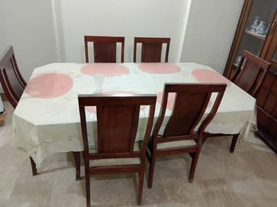 Wooden Dining table with six chairs