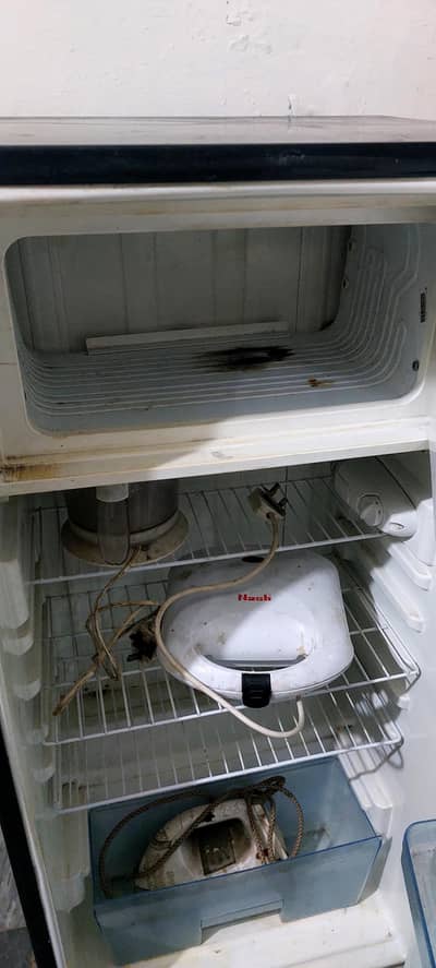 less used medium size fridge
