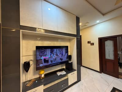 Beautiful prime location of khayban e Tanveer Tripale story house for sale
