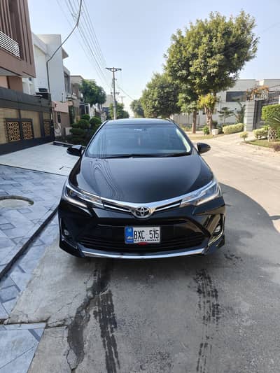 VIP Toyota Corolla Altis Grande (Black Interior) with Driver.