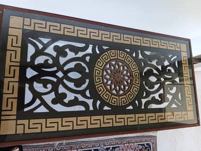 Center table, wood carving with glass top