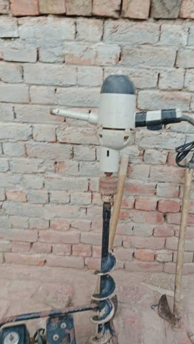 Earth auger / soil drill machine