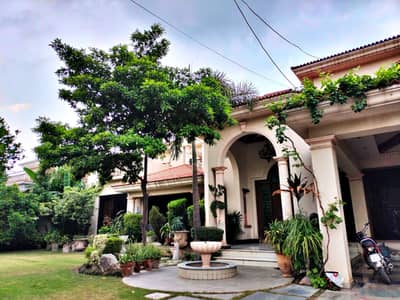 2 Kanal Slightly Used Spanish Design Well Maintained 6-Bedroom Bungalow For Sale at Prime Location of DHA Lahore Near To Park Masjid & Commercial Market .