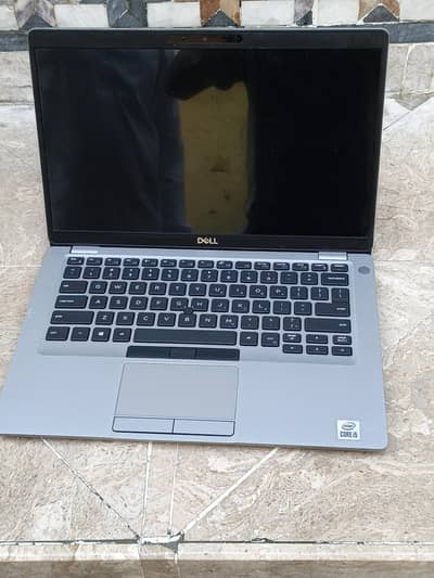 Dell i5 Good condition 10/9.5 minor colour scratches on keyboard.