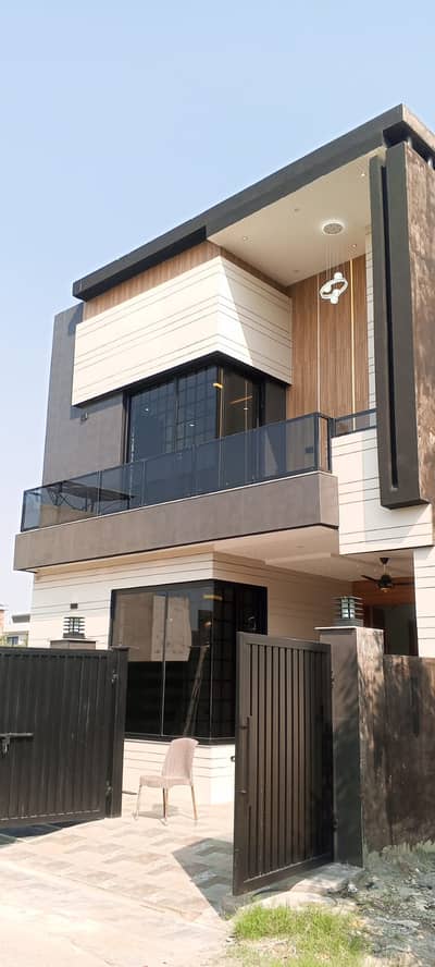 5 marla brandnew house jade ext block 4 bed 4 bath 2 tv lounge 2 kitchan 230 lakh demand