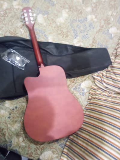 New komabt guitar  no use with one string 3 picks and belt