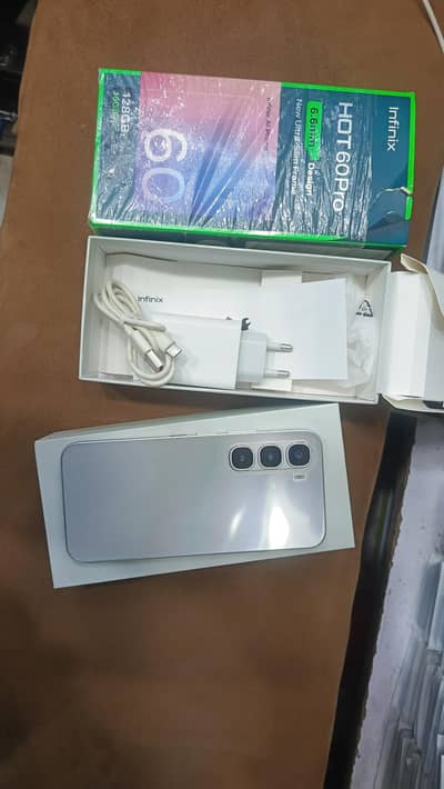 Infinix Hot 60 Pro 8 128 with original box charger no open repair