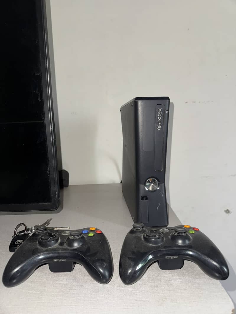 Xbox 360 Slim 0