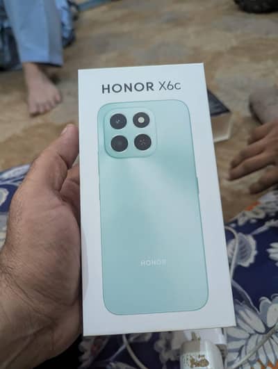 Honor X6c mobile with box and charger