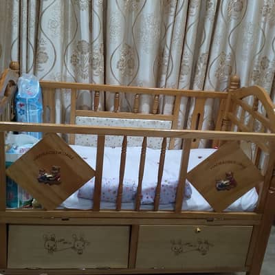 Baby crib with swing