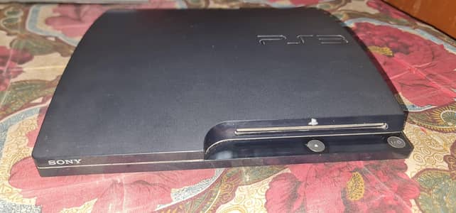Sony PS3 Slim 320GB + 2 Controllers + 12 Games