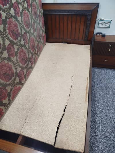 single bed with side table
