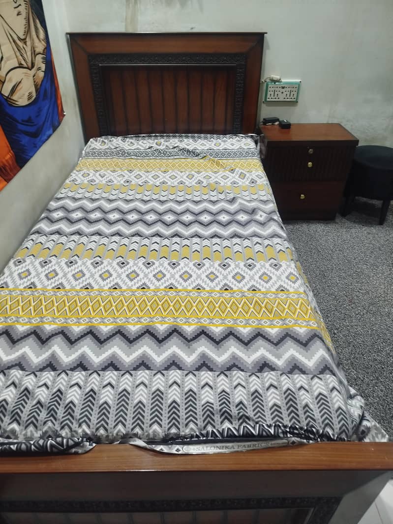 single bed with side table 3