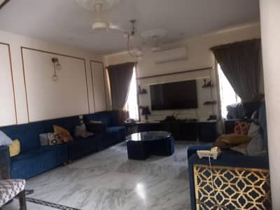 12 seater L shape sofa set, center table, 6 stools.