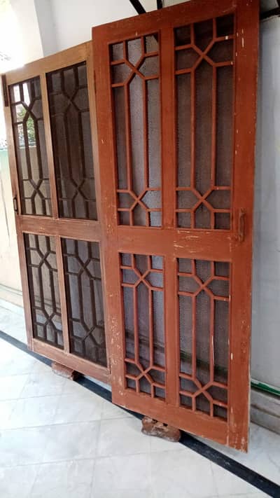 Wooden Doors with net fitting.