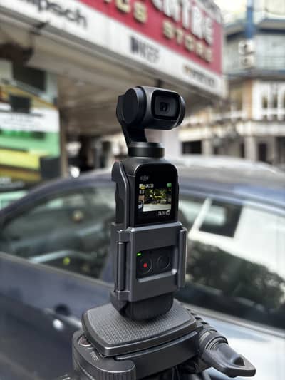 DJI Osmo Pocket 1 (4K Gimbal Camera) & tripod attachment