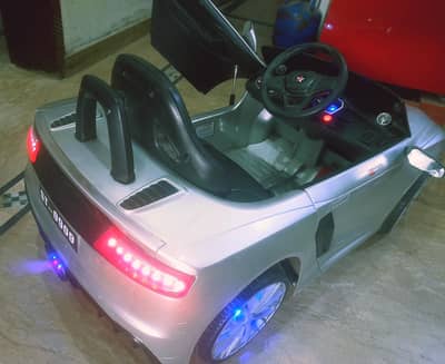 IMPORTED KIDS CAR with REMOTE /SWING FUNCTION &OPENABLE HYDROLIC DOORS
