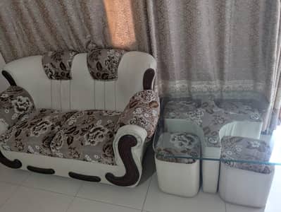 7 seater sofa set with glass table + 4 stools
