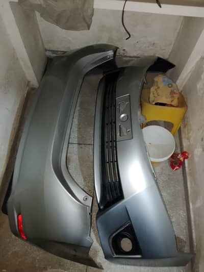 Toyota Corolla gli front back bumpers genuine.