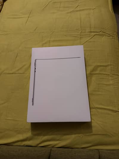Silver 15 inch mac book