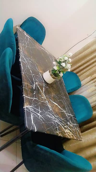 6 seetar top marbal table with chairs used good condition
