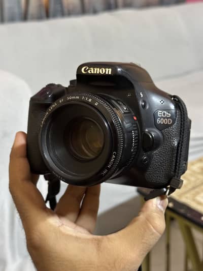 Canon 600D DSLR with Canon original 50mm lens 100% WORKING