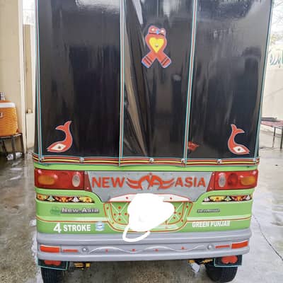 New Asia auto rickshaw six saets internally.