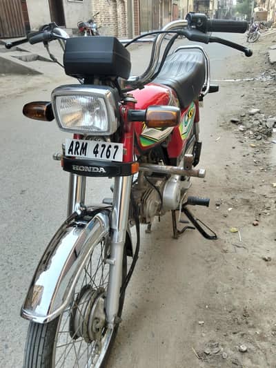 Honda CD 70||TOTAL GENUINE