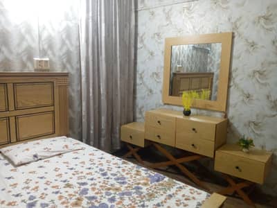 wooden bed / dressing table / side tables no mattres