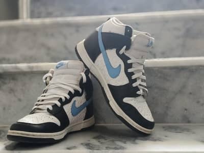 shoes Nike Dunk High Retro FLC "Black University Blue White" hain.
