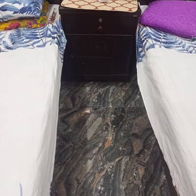 2 single bed with matress and 1 side table