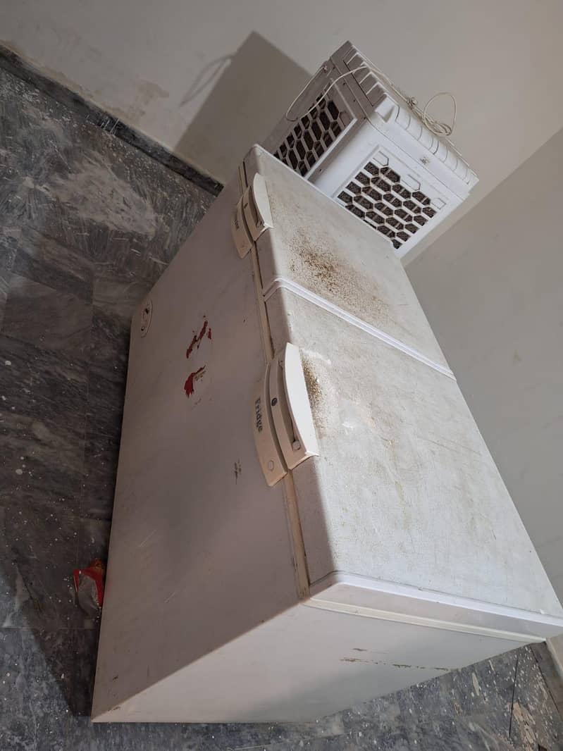 twin freezer and fridge in good condition and 1 microwave oven also in 0