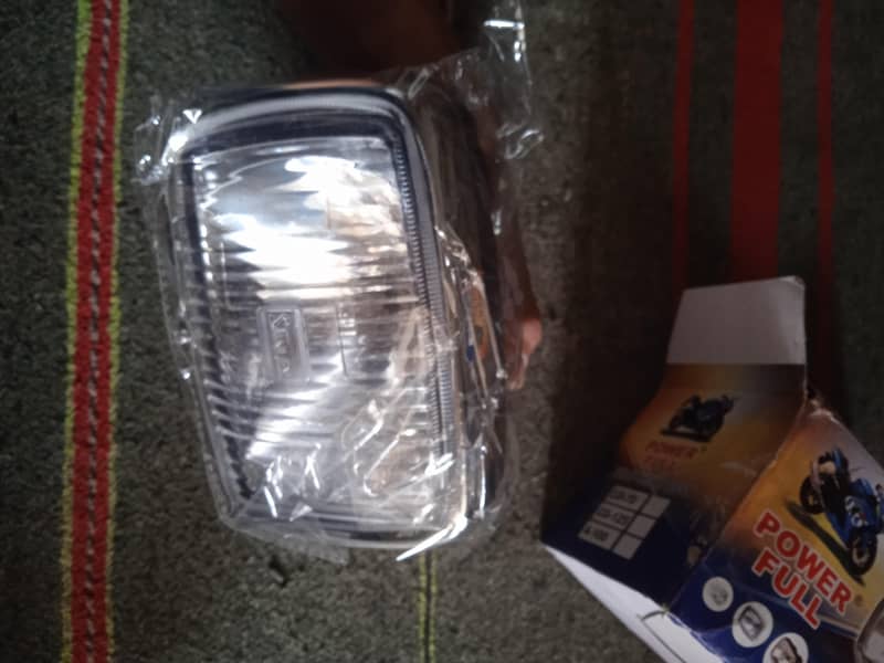 motorcycle CD 70 headlights 1
