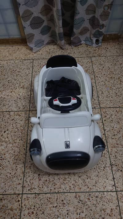 RECHARGEABLE BATTERY OPERATED CAR PANDA THEME CONDITION LIKE NEW