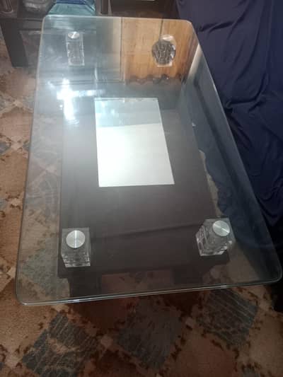 Glassand wooden coffee table