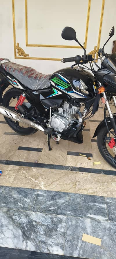 honda deluxe 125 model 2026