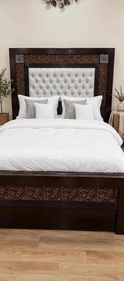 large bed 2 side tables one dressing in good condition