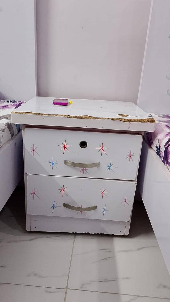 2 beds, 1 side table and study table 0