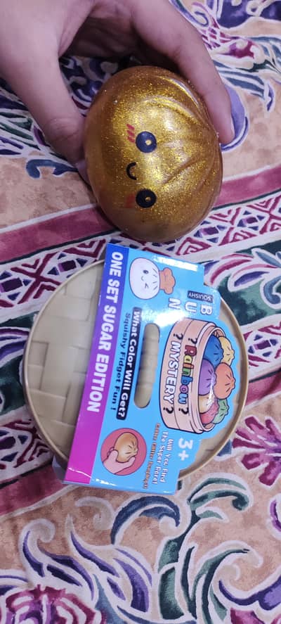 super rare golden squishy ball