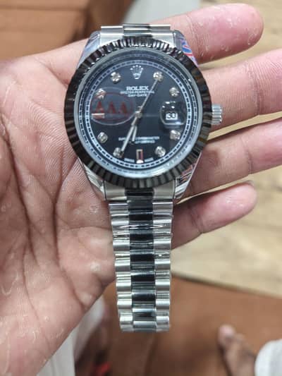 Rolex oyster perpetual day_ date
