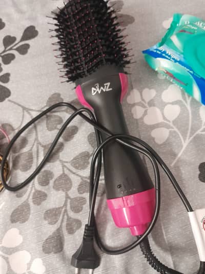 2 in 1 hair styler plus dryer and curler. .