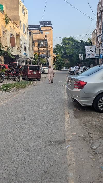 Prime 2.86 Marla Used Commercial Plaza | 4 Floors | Super Hot Location | Model Town Lahore