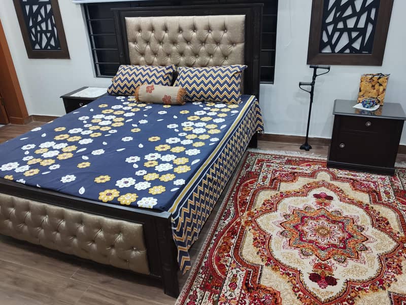 Queen size bed with two side tables 1