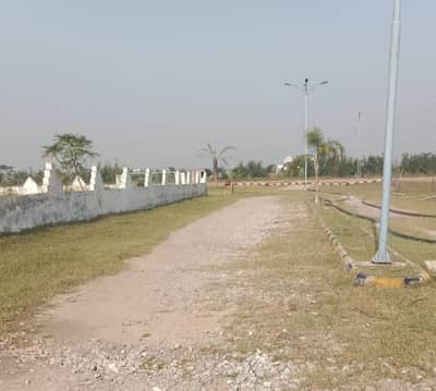 Better opportunity for society and housing project per kanal 15 lac near chakri interchange 7 kilo meter distance and half kilo meter bazar banks etc