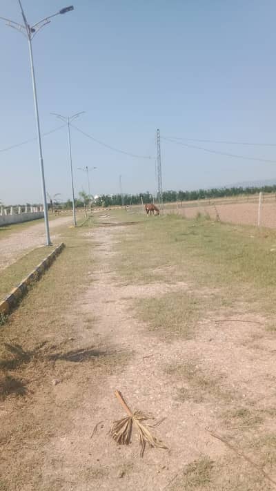 Better opportunity for society and housing project per kanal 15 lac near chakri interchange 7 kilo meter distance and half kilo meter bazar banks etc