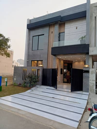 TOP LOCATION 5 MARLA ELEGANT AND FULLY MAINTAINED SUPER HOT LOCATED BUNGALOW ON MAIN 150-FEET WIDE ROAD IS AVAILABLE IN THE BEST BLOCK OF DHA PHASE 9-TOWN LAHORE AT A VERY REASONABLE DEMAND.