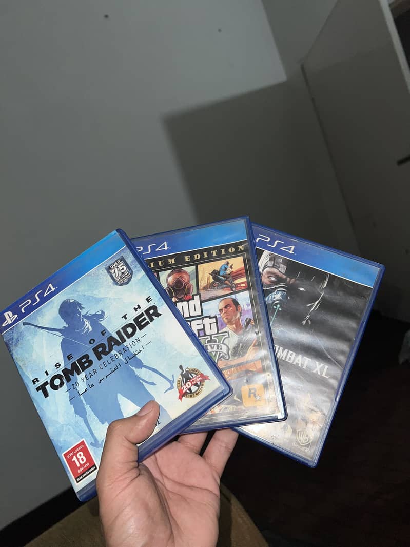 Ps4 games and 2 controllers 1